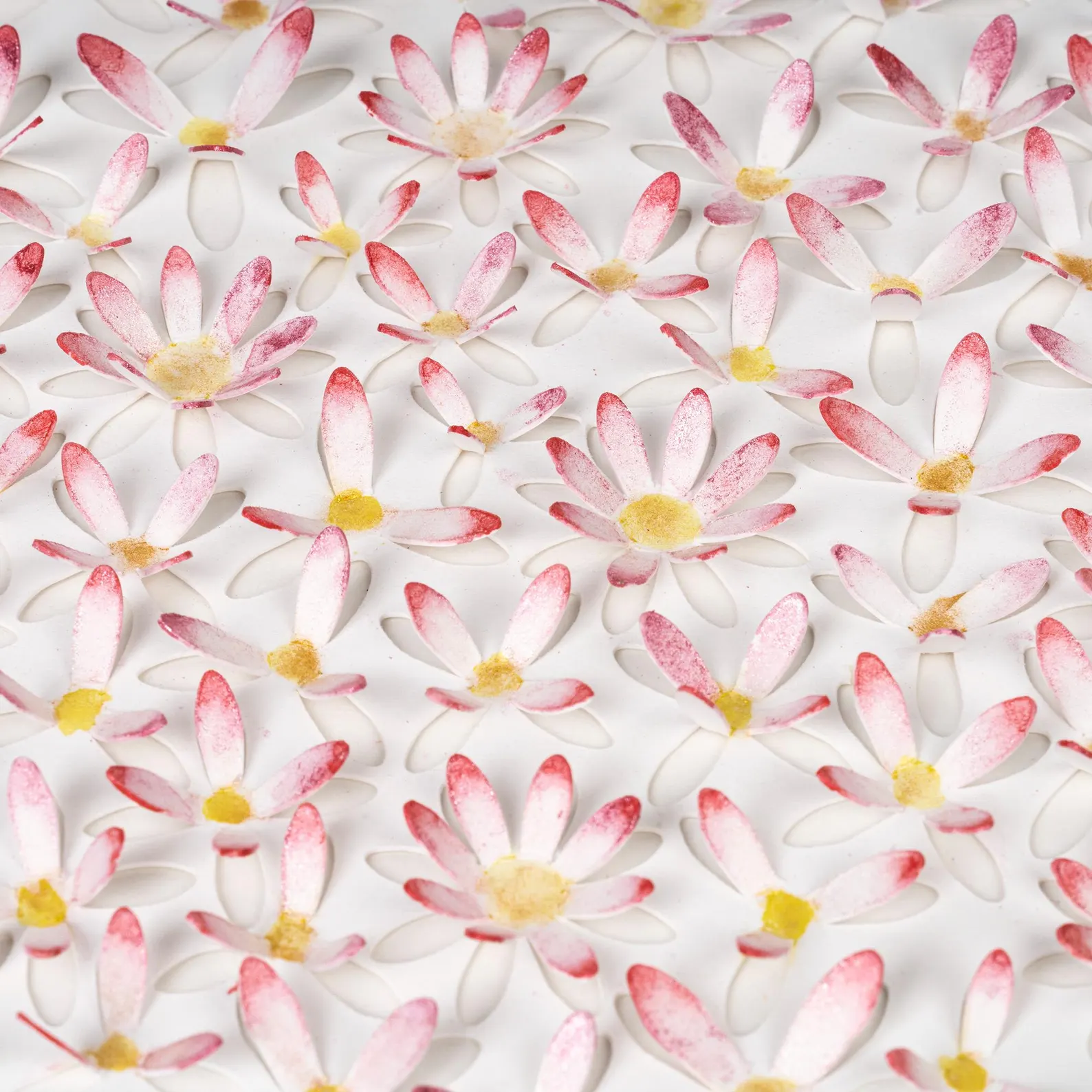 Close-up detail of pink daisy circle 3D watercolor wall art showing raised hand-painted paper flowers